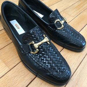 Vintage black leather loafers with gold buckle